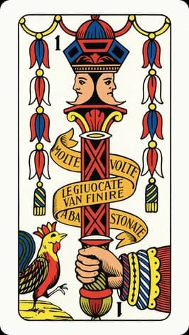 The ace of bati in the Traditional deck: a hand gripping one ornate baton crowned with two faces, a ribbon reading “Molte volte le giuocate van finire a bastonate”, and a rooster beside it.